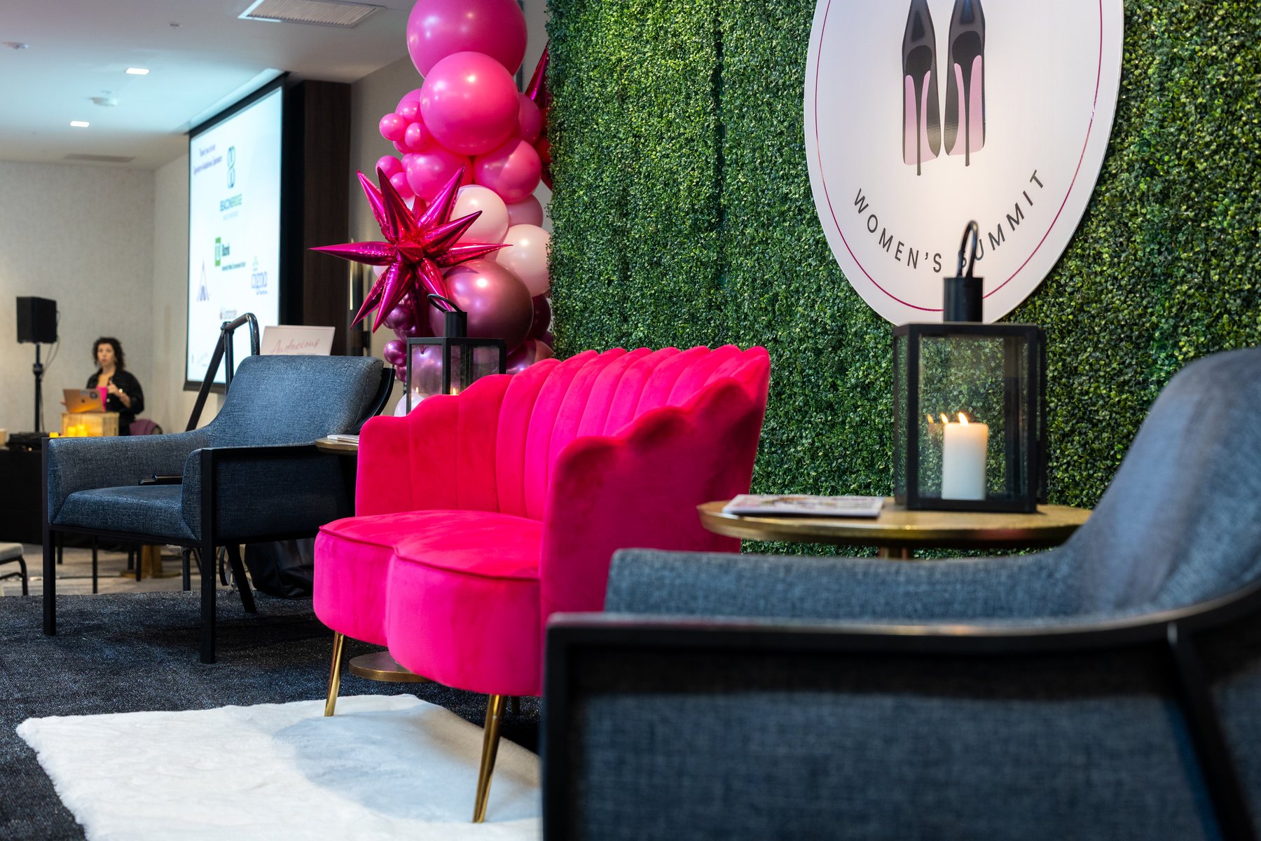The pink couch stage at the Audacious Women's Summit