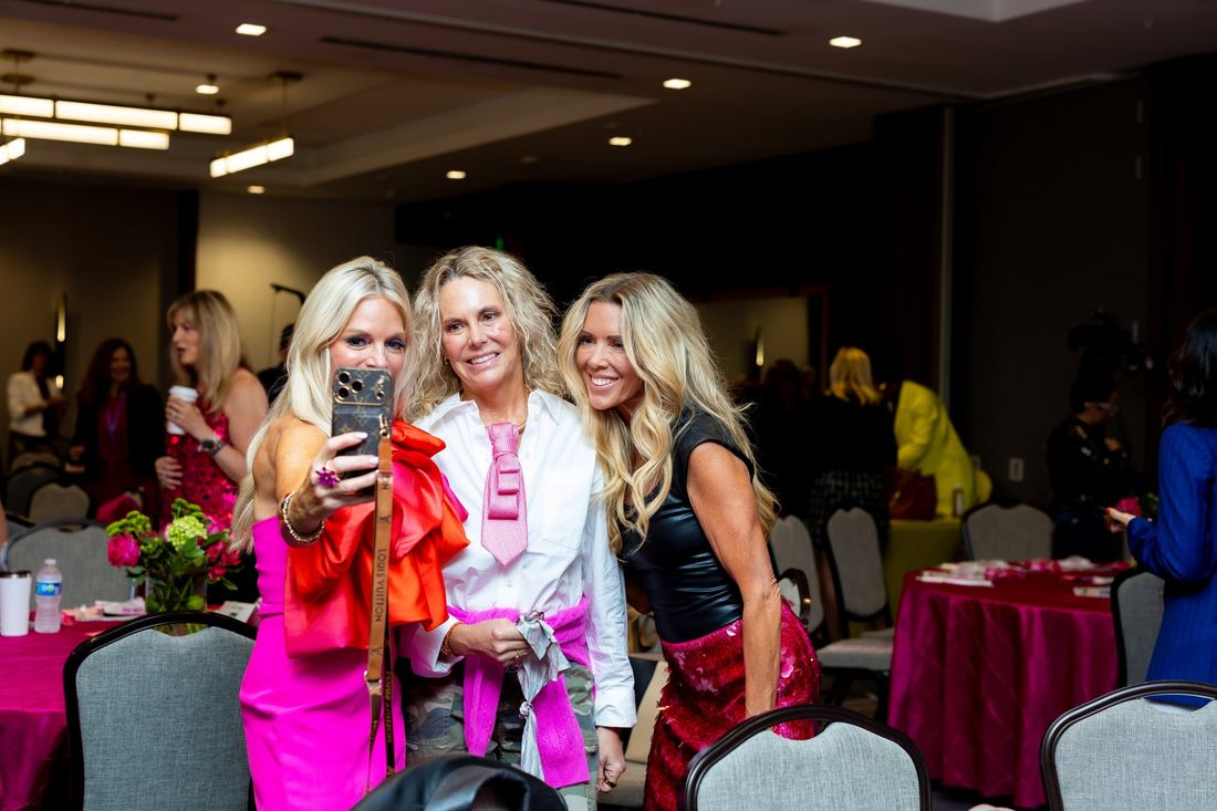 Three women taking a selfie at the Summit