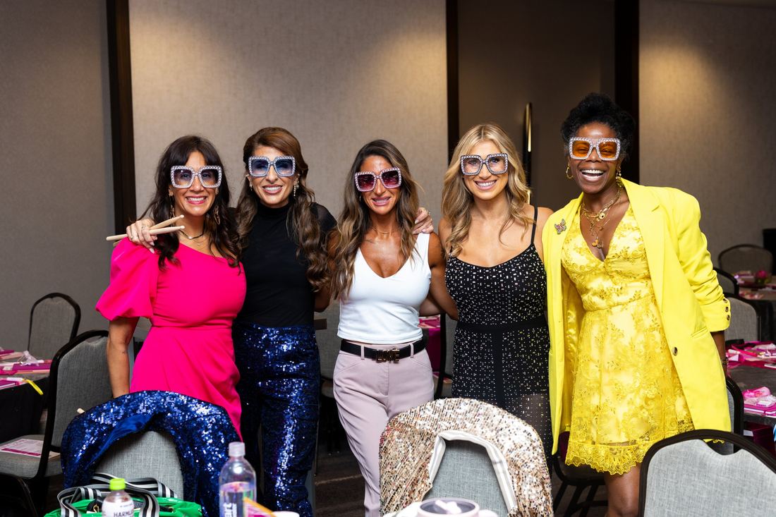 Five women in sparkly oversized sunglasses